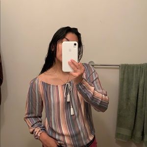 Long sleeve loose fitted top. Pastel stripes